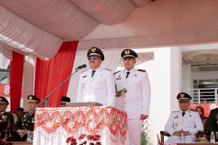upati Pidie H. Sarjani Abdullah, S.H., M.H. bertindak sebagai Inspektur Upacara pada peringatan HUT ke-81 Kemerdekaan Republik Indonesia Tahun 2026 di Halaman Gedung Pidie Convention Center (PCC), Senin (17/08/2026).
